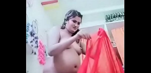  Swathi naidu showing her body and wearing red saree